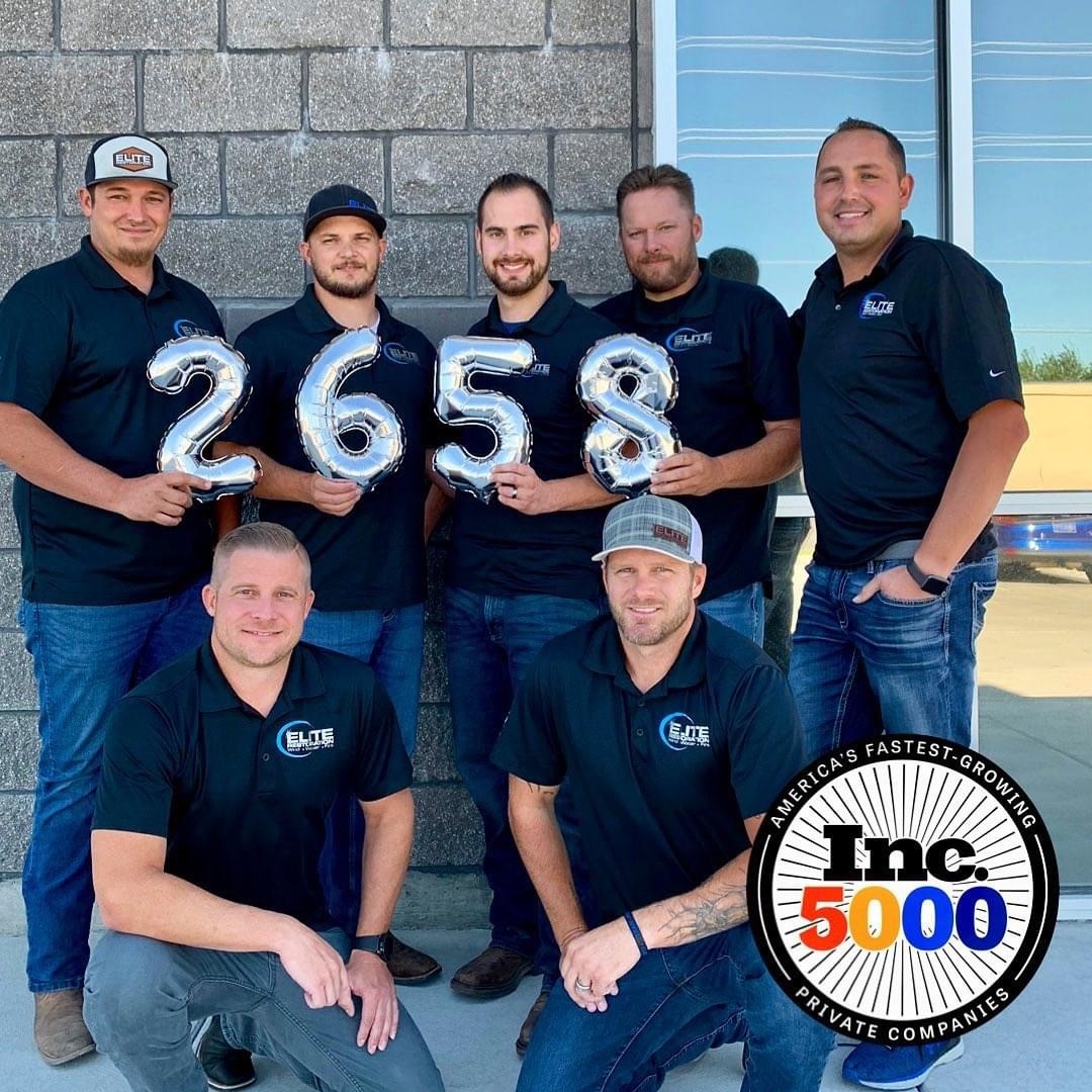 Elite Restoration team photo celebrating being placed 2658th on Inc. 5000 fastest growing business.